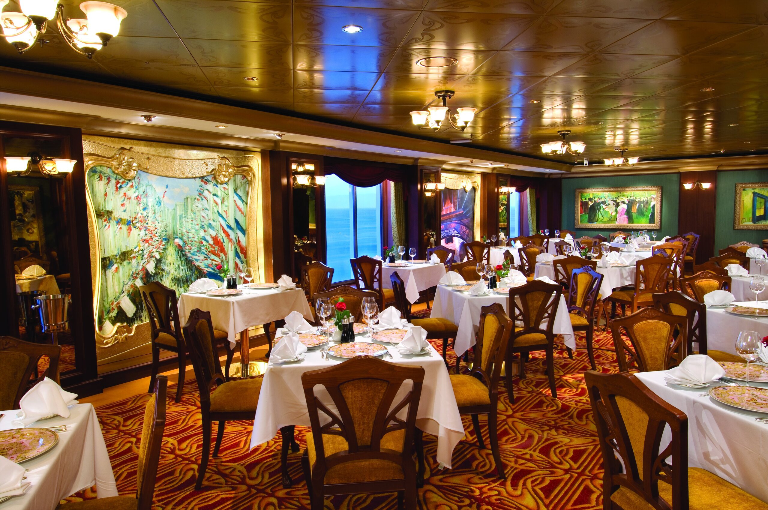 Le Bistro French restaurant on Norwegian Jewel laid for dinner